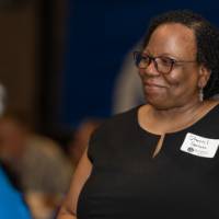 Dr. Sherril Soman smiles during a conversation